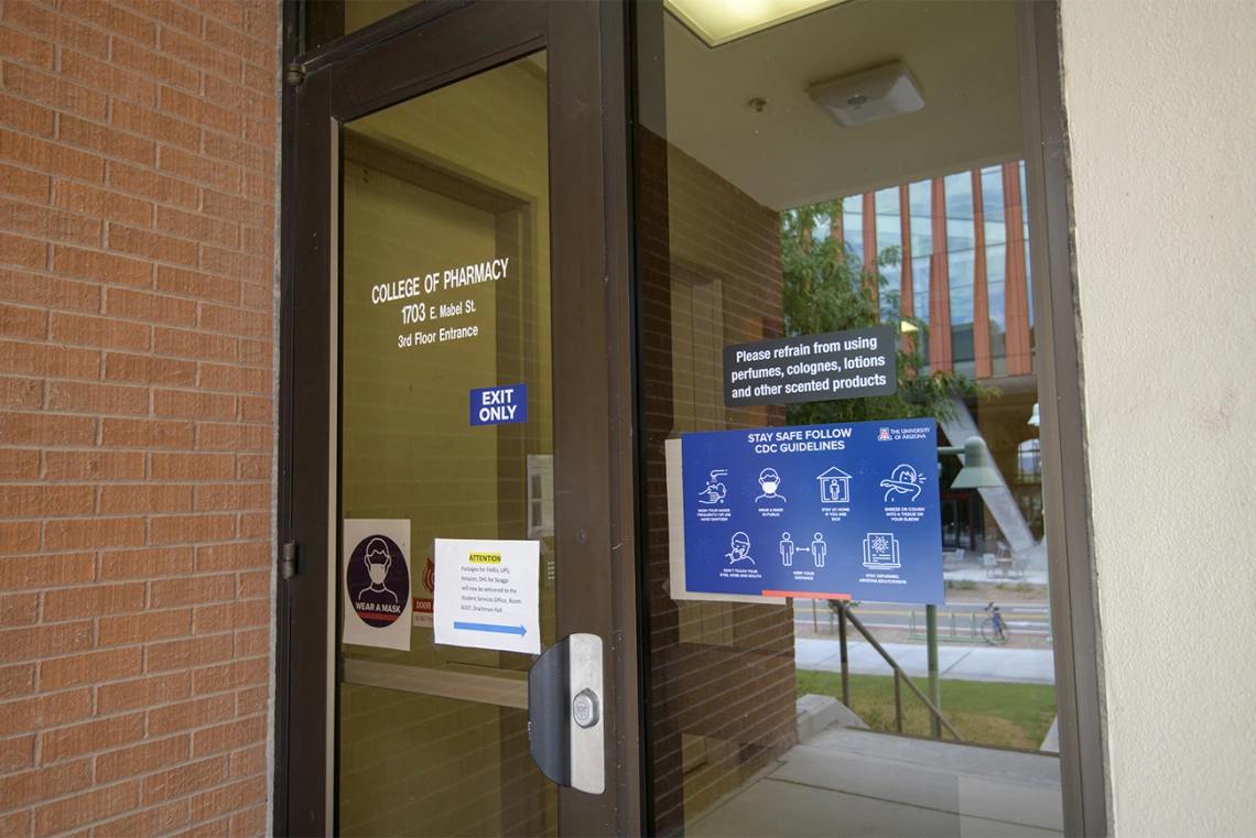 Signage reminds passersby to follow the CDC guidelines. 