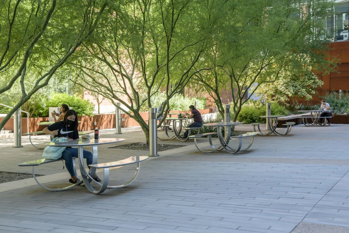 The courtyard between BIO5 and the Bioscience Research Laboratories on the Tucson campus is a favorite place for many people to stop and enjoy food and drink after visiting the nearby Catalyst Café. 