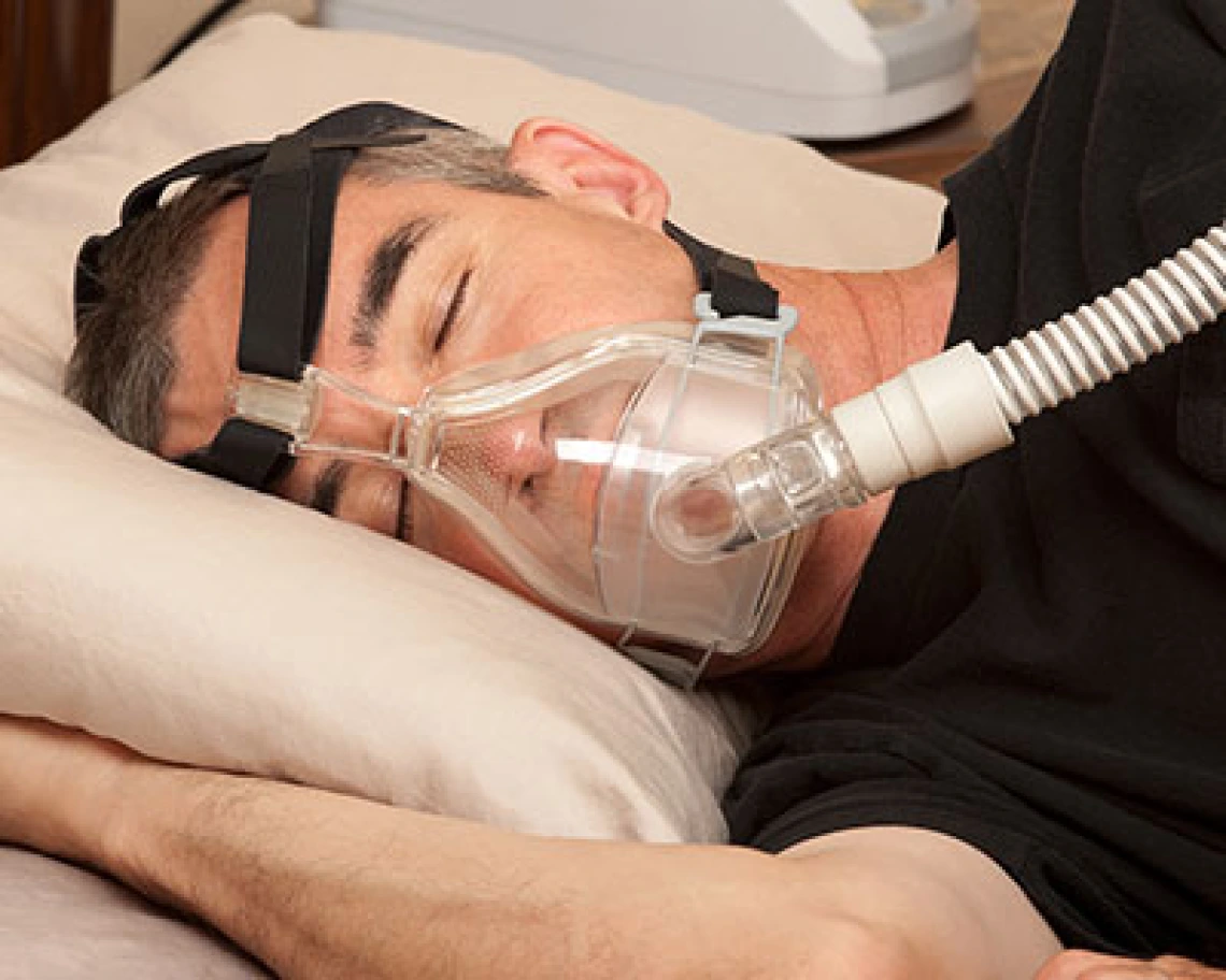 Person using a CPAP machine