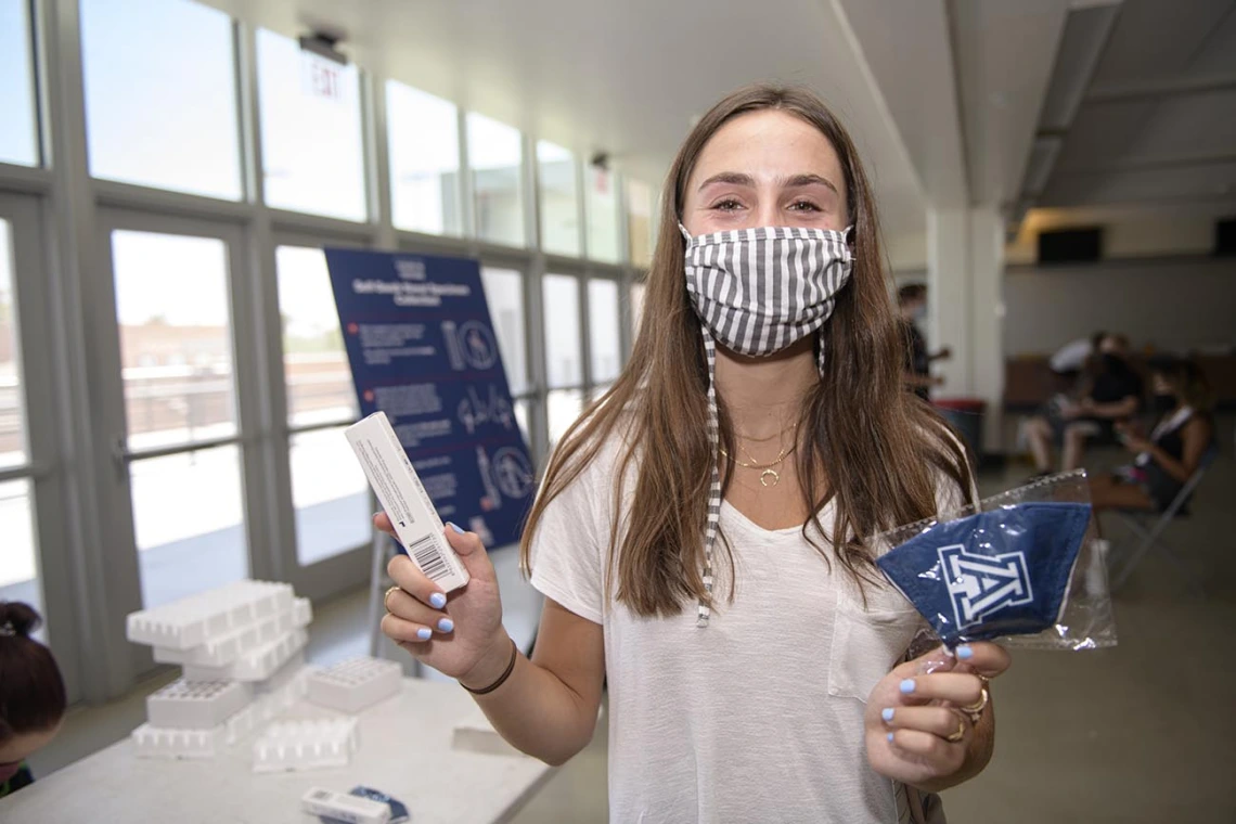 After taking a COVID-19 test, students get a free face mask and digital thermometer to help monitor symptoms as part of Wildcat Wellcheck.