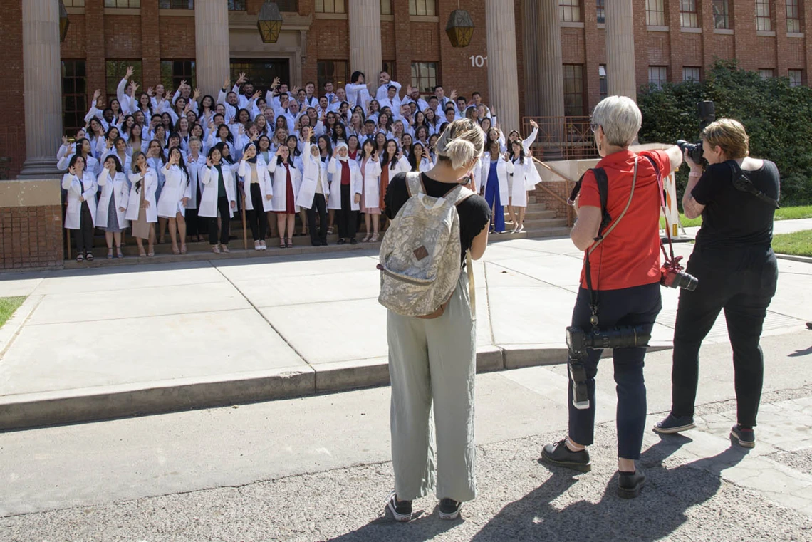 Photographers capture the moment for R. Ken Coit College of Pharmacy class of 2023 after their white coat ceremony.