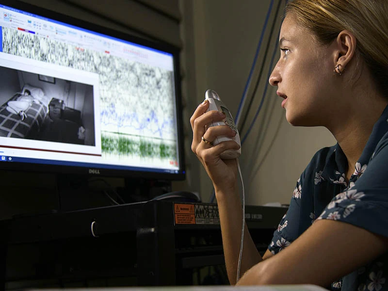 woman operating computer