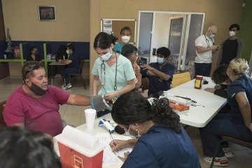 University of Arizona pre-med students take vitals before patients can see a doctor.