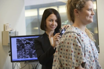 doctor examining patient