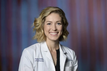 portraint of PCP Scholarship recipient Megan Kelly in white coat