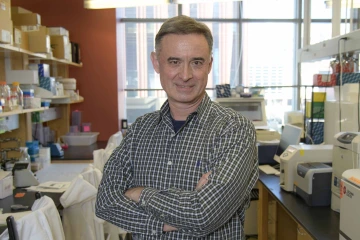 Portrait of immunologist Janko Nikolich, MD, PhD, in his research lab at the University of Arizona Health Sciences