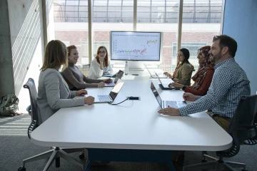 Hakim (right) was part of the first class of students to complete the 22-month Genetic Counseling Graduate Program and earn a Master of Science degree, preparing him for a career in the rapidly expanding field. 