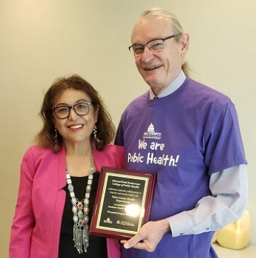 Iman Hakim, dean and professor of the UA Mel and Enid Zuckerman College of Public Health and Bob England, interim director of the Pima County Health Department. (Photo: Aaron Pacheco)