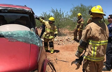 Med-Start 2018 participants learn how to remove a “victim” from a wrecked car.