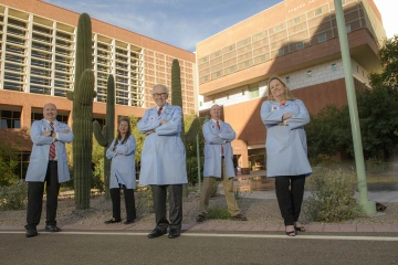 L-R: Mike Holcomb, associate director for information technology; Janet Major, associate director for education; Ronald S. Weinstein, MD, founding director; Robert Kerr, principal budget analyst; and Kris Erps Stewart, associate director of administration