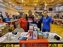 Sheila Soto making follow-up calls about COVID-19 and Tucson Mobile Health Unit client needs from home in April 2020. (Photo: University of Arizona/Sheila Soto)