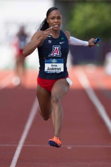 Action photo of Brena Andrews running for the U of A track team. 