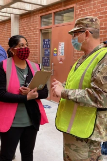 Arizona Department of Emergency and Military Affairs Director Major General Michael T. McGuire consults with Dr. Arora at the walk-in vaccine clinic in the Ina E. Gittings Building just off the UArizona Mall. (Courtesy Mona Arora, PhD, MSPH)