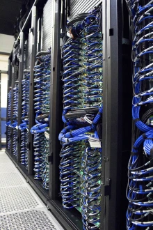 Computer server with blue wires at the University of Arizona's High Performance Computing Center. 