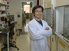 Jun Wang, PhD, is hoping to advance drug development for COVID-19 therapeutics by studying two compounds that inhibit key proteins involved in viral replication of SARS-CoV-2. (University of Arizona Health Sciences, Kris Hanning)